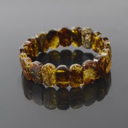 Classic shape medium green amber bracelet